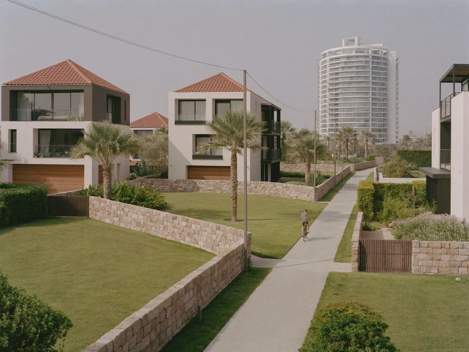 Modern family townhouses with small front gardens in Mudon, Dubai